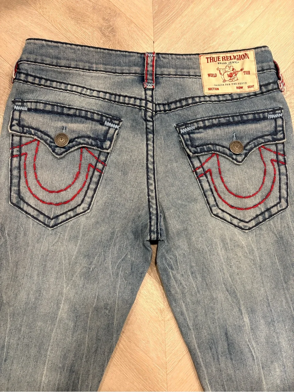 True Religion Light Wash Denim Jeans with Red Stitching